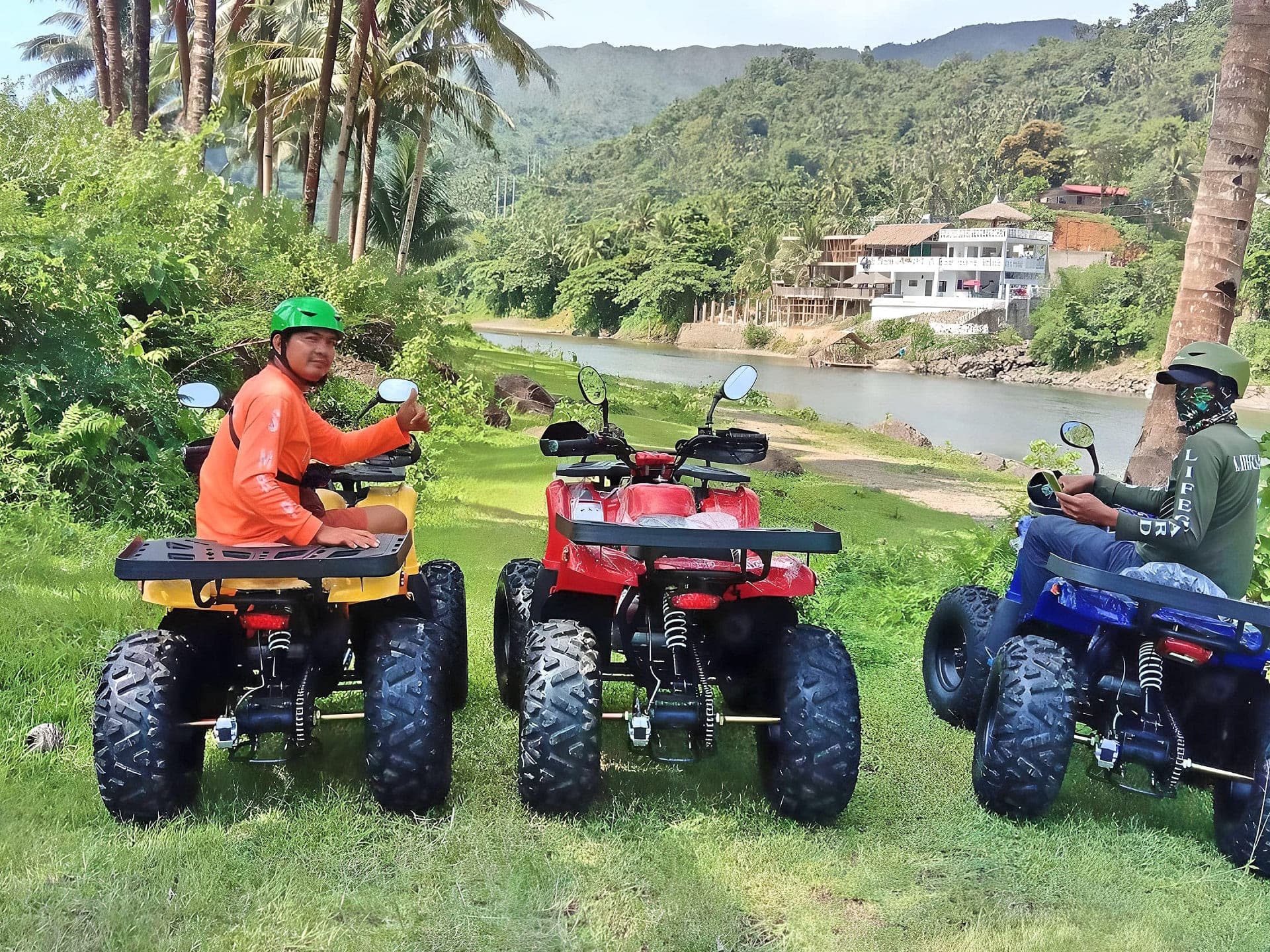 ATV riders by the river